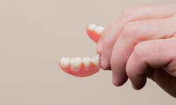 Implant-Supported Dentures: Stability Without Adhesive